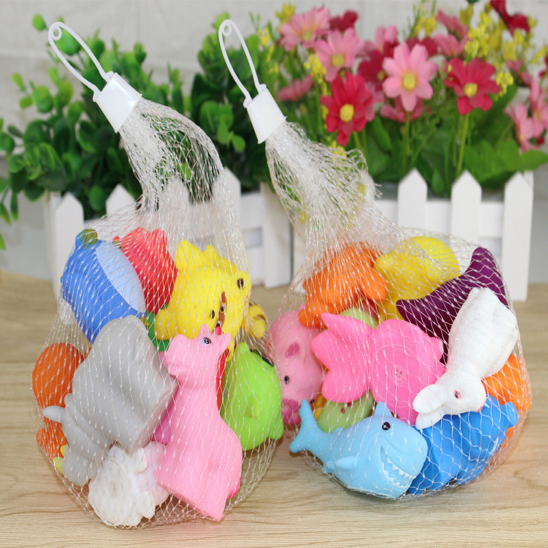 Factory direct sound sound shower water toys children pinching silicone animal bath small yellow duck net bag packaging alfamoba