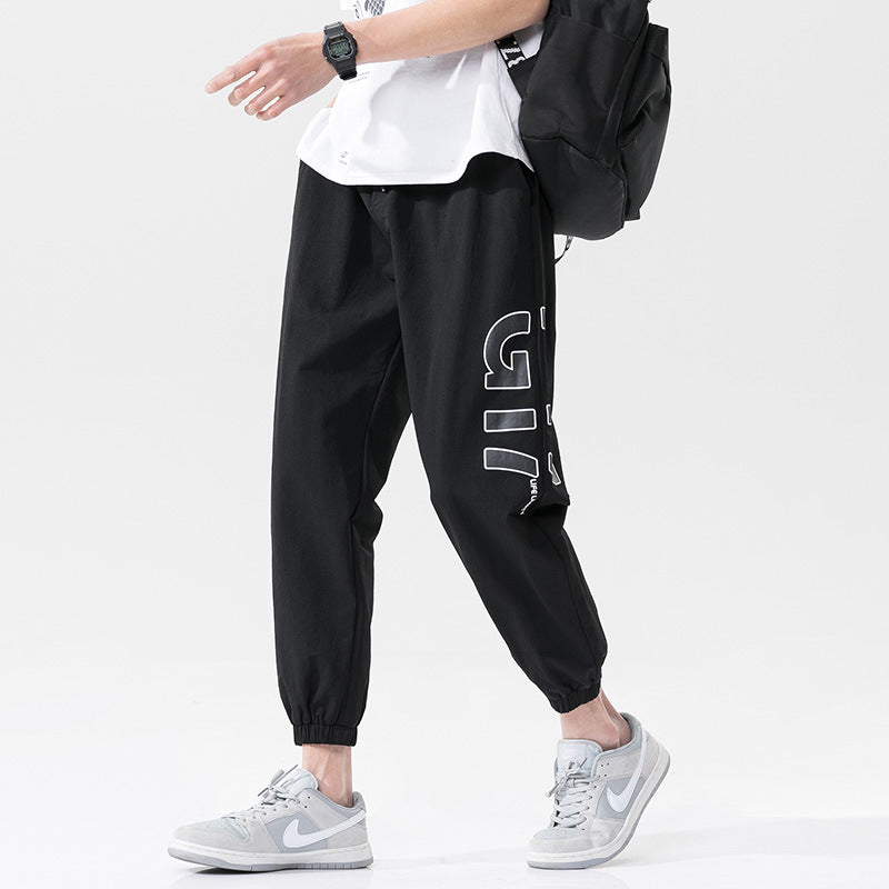 Summer men's casual exercise trousers Korean version of the tide loose Oversize beam adolescents nine-point guards alfamoba