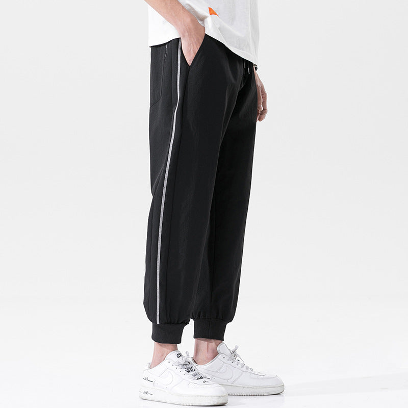 Summer men's casual exercise trousers Korean version of the tide loose Oversize beam adolescents nine-point guards alfamoba