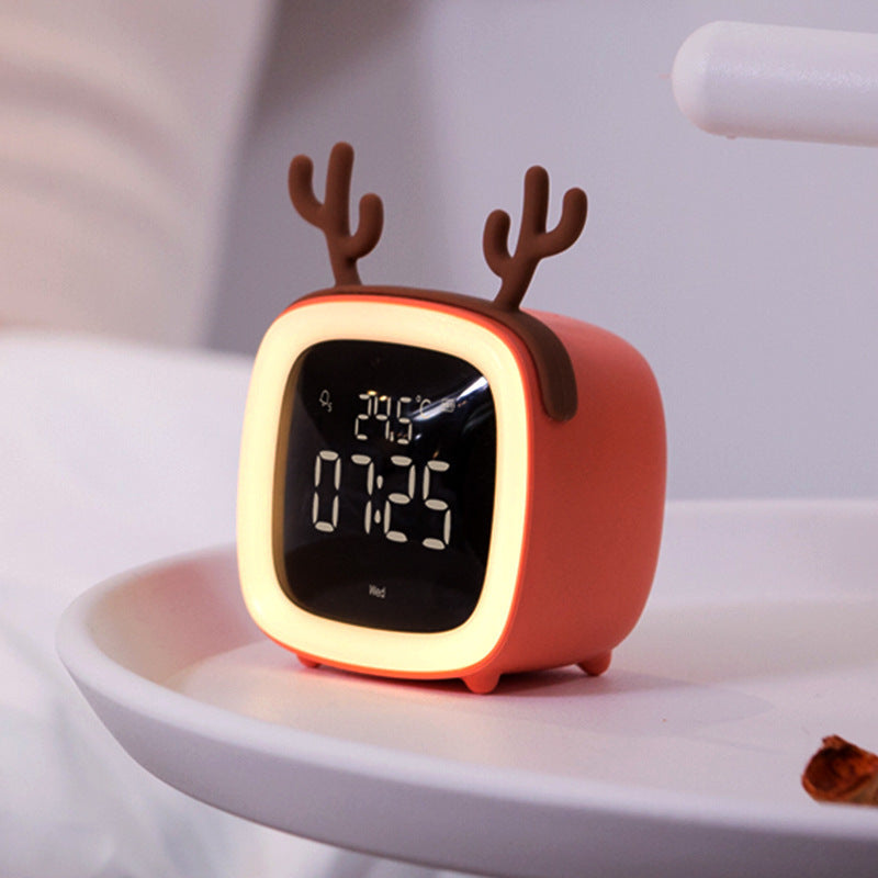 Cross-border new cute pet TV alarm clock creative student lazy dormitory digital clock USB charging student alarm clock alfamoba