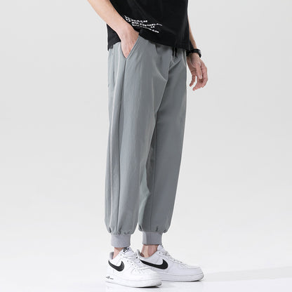 Summer men's casual exercise trousers Korean version of the tide loose Oversize beam adolescents nine-point guards alfamoba