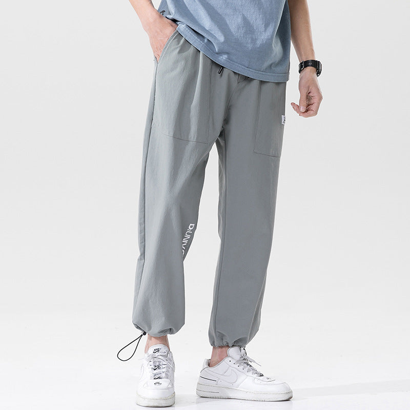 Summer men's casual exercise trousers Korean version of the tide loose Oversize beam adolescents nine-point guards alfamoba