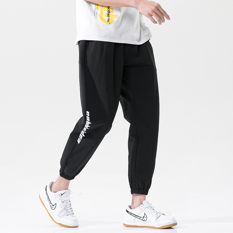 Summer men's casual exercise trousers Korean version of the tide loose Oversize beam adolescents nine-point guards alfamoba