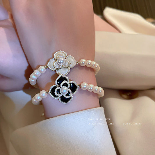 Japanese and Han Xiaoxiang Feng Elegant Pearl Mountain Camellia Flower Bracelet INS Network Red New Simple Fashion Handwear alfamoba