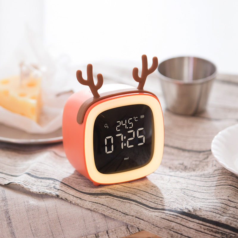 Cross-border new cute pet TV alarm clock creative student lazy dormitory digital clock USB charging student alarm clock alfamoba