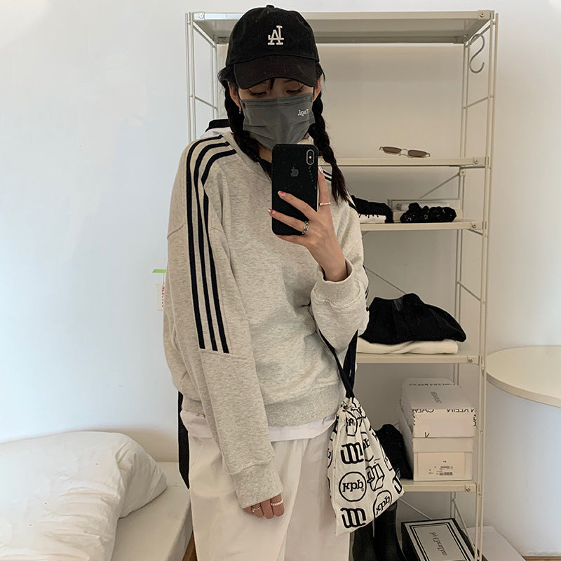 Nan Tao early autumn new Korean version of ins casual sports style profile hooded long-sleeved sweater loose and thin blouse women alfamoba